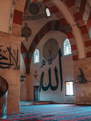 pexels-photo-12123506-12123506 Explore the exquisite artistry of Ottoman architecture with intricate mosaics and calligraphy inside a historic mosque.